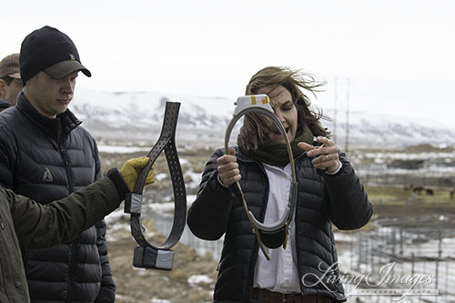 USGS holding radio collars, the one on the right is for the study